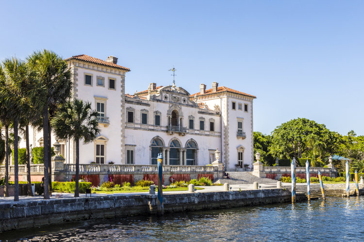 Exterior shot from the water of Vizcaya house and gardens